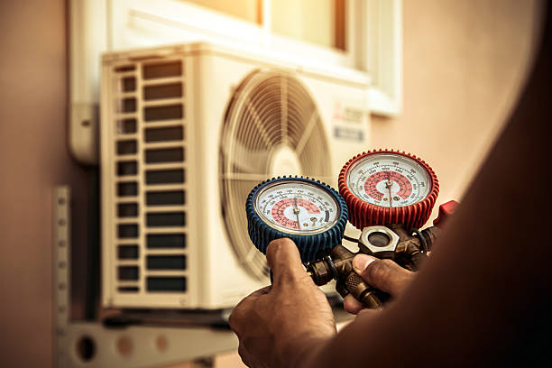 Professional Ductwork Repair technician working in De Armanville, AL